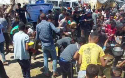 Gaza family on the chaotic food distribution due to starvation
